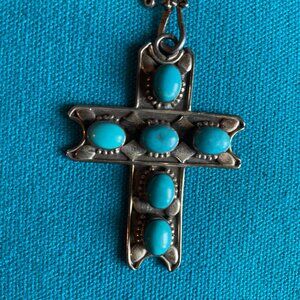Delightful cross with inlaid turquoise